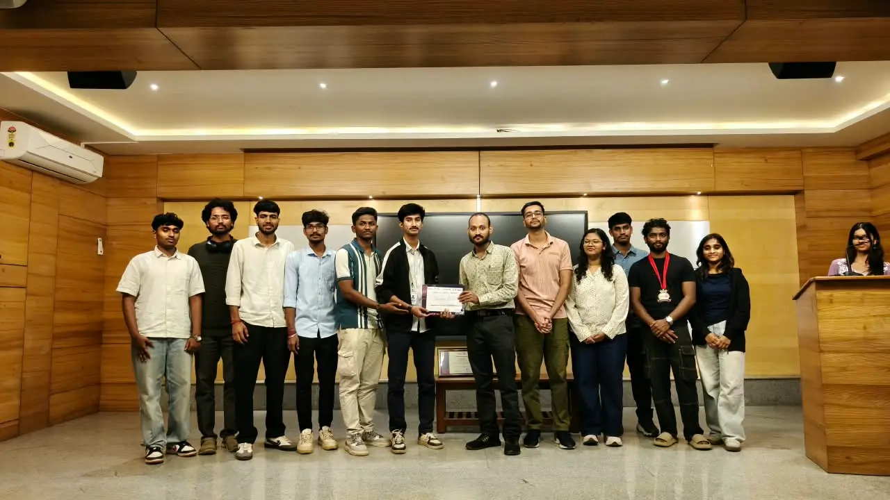 Amit Kumar Singh with a winning team on stage