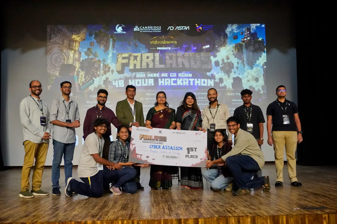 Amit Kumar Singh presenting the 1st prize to Cyber Assassin