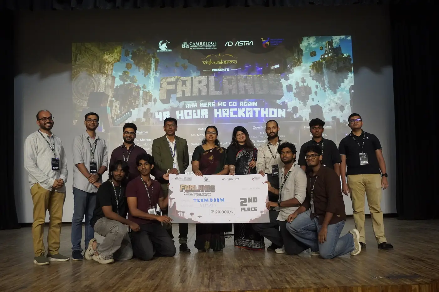 Amit Kumar Singh presenting the 2nd prize to Team Doom