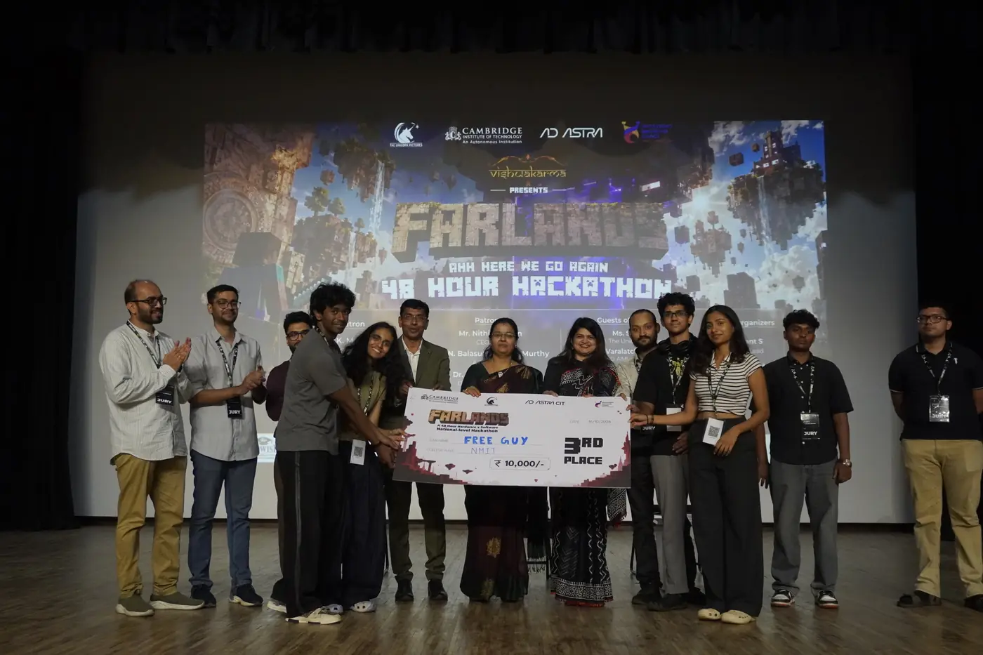 Amit Kumar Singh presenting the 3rd prize to Free Guy