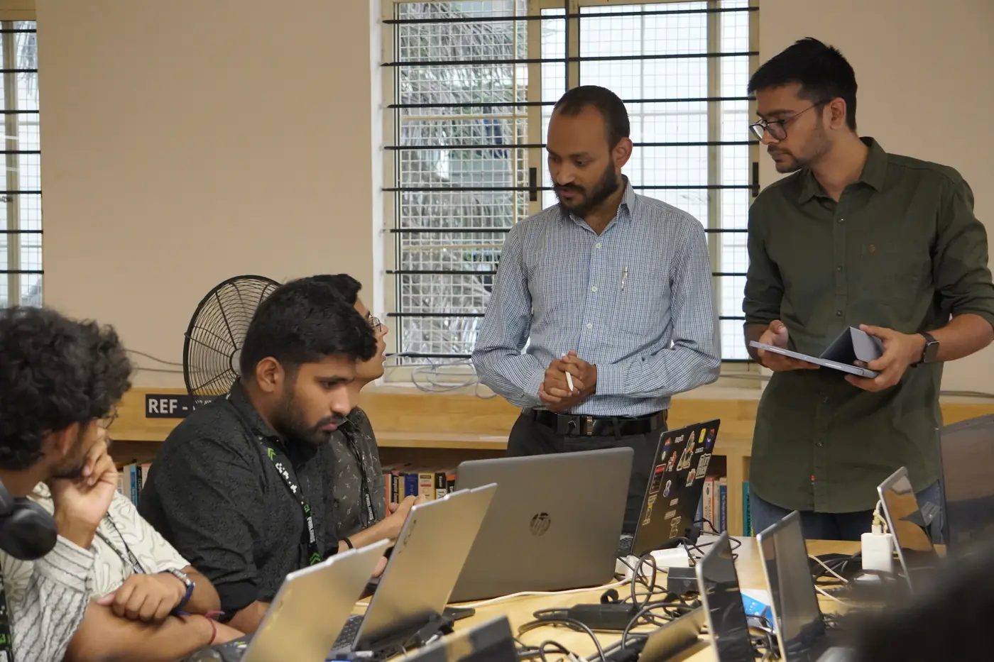 Amit Kumar Singh judging a team at Farlands