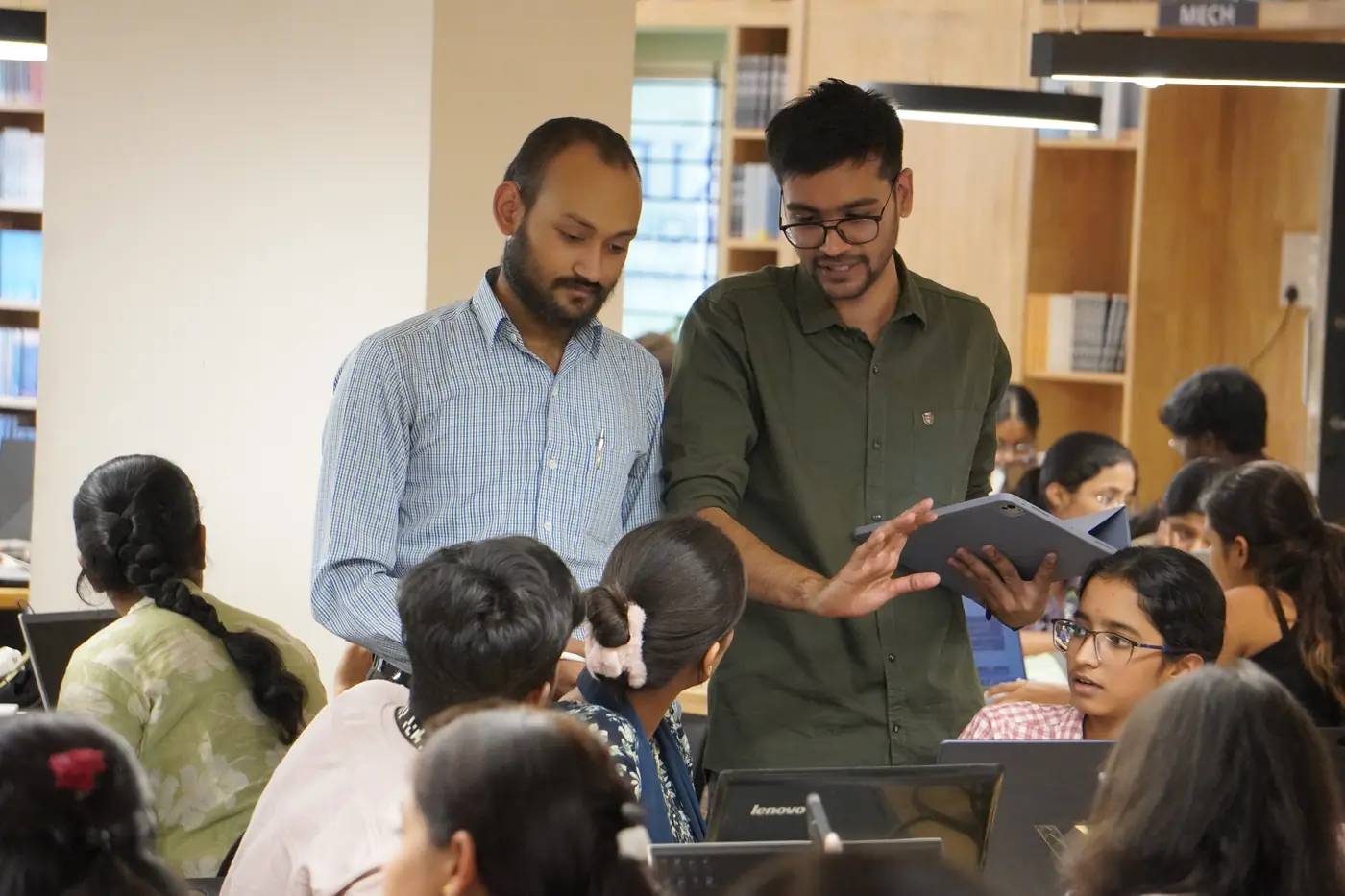 Amit Kumar Singh reviewing a prototype