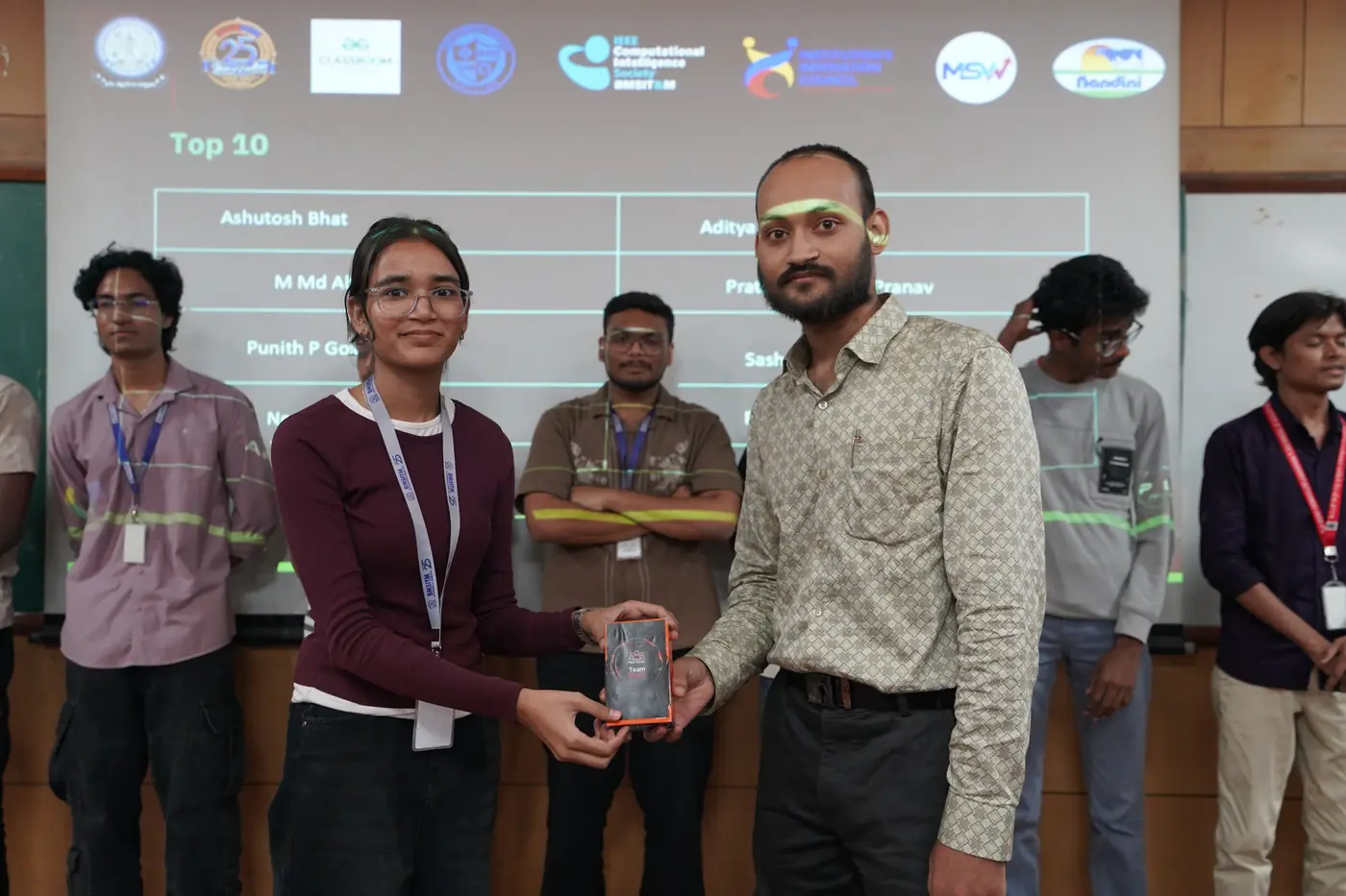 Amit Kumar Singh presenting a Top 10 award at ProtocolX