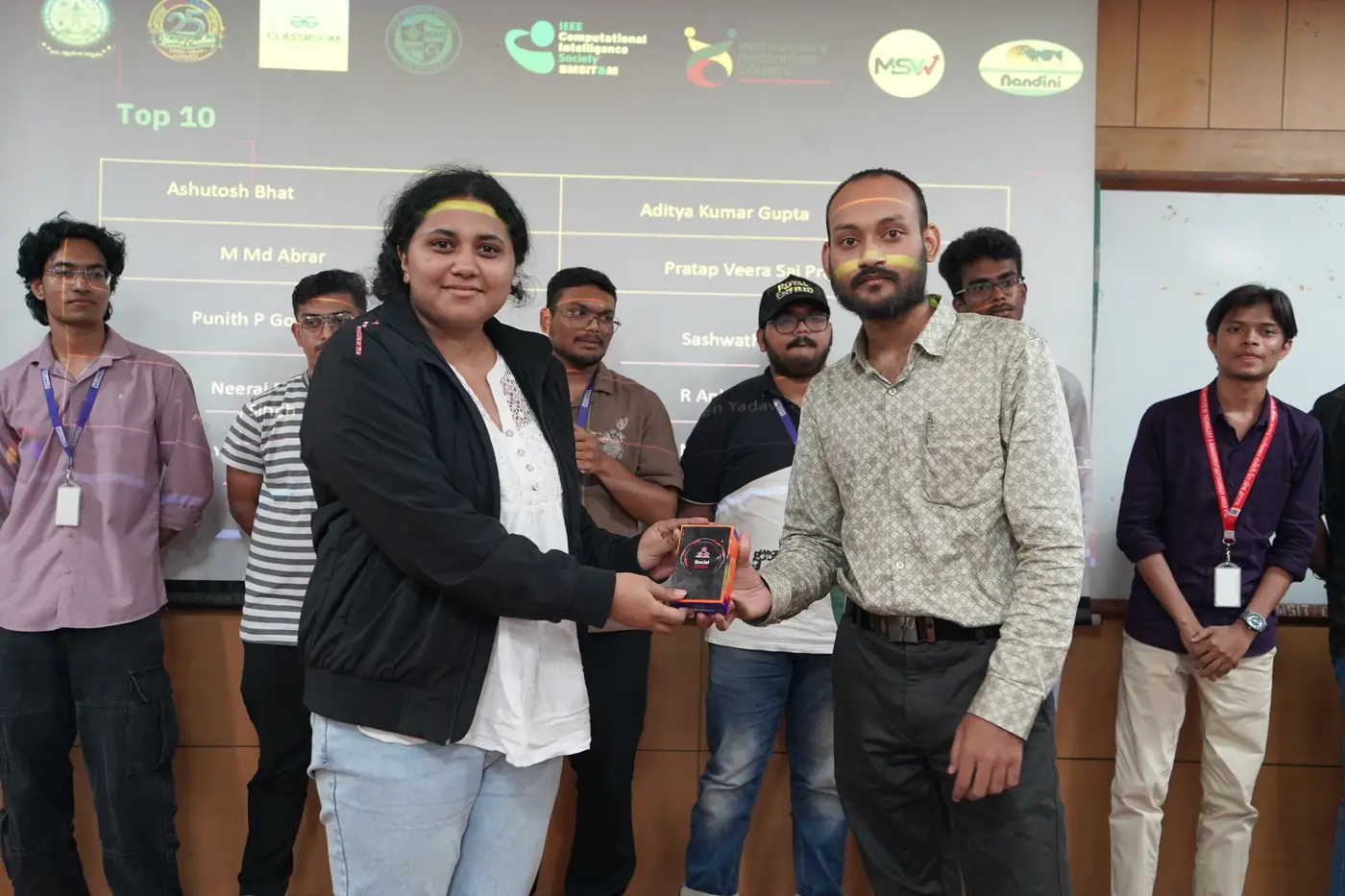 Amit Kumar Singh presenting a Top 10 award