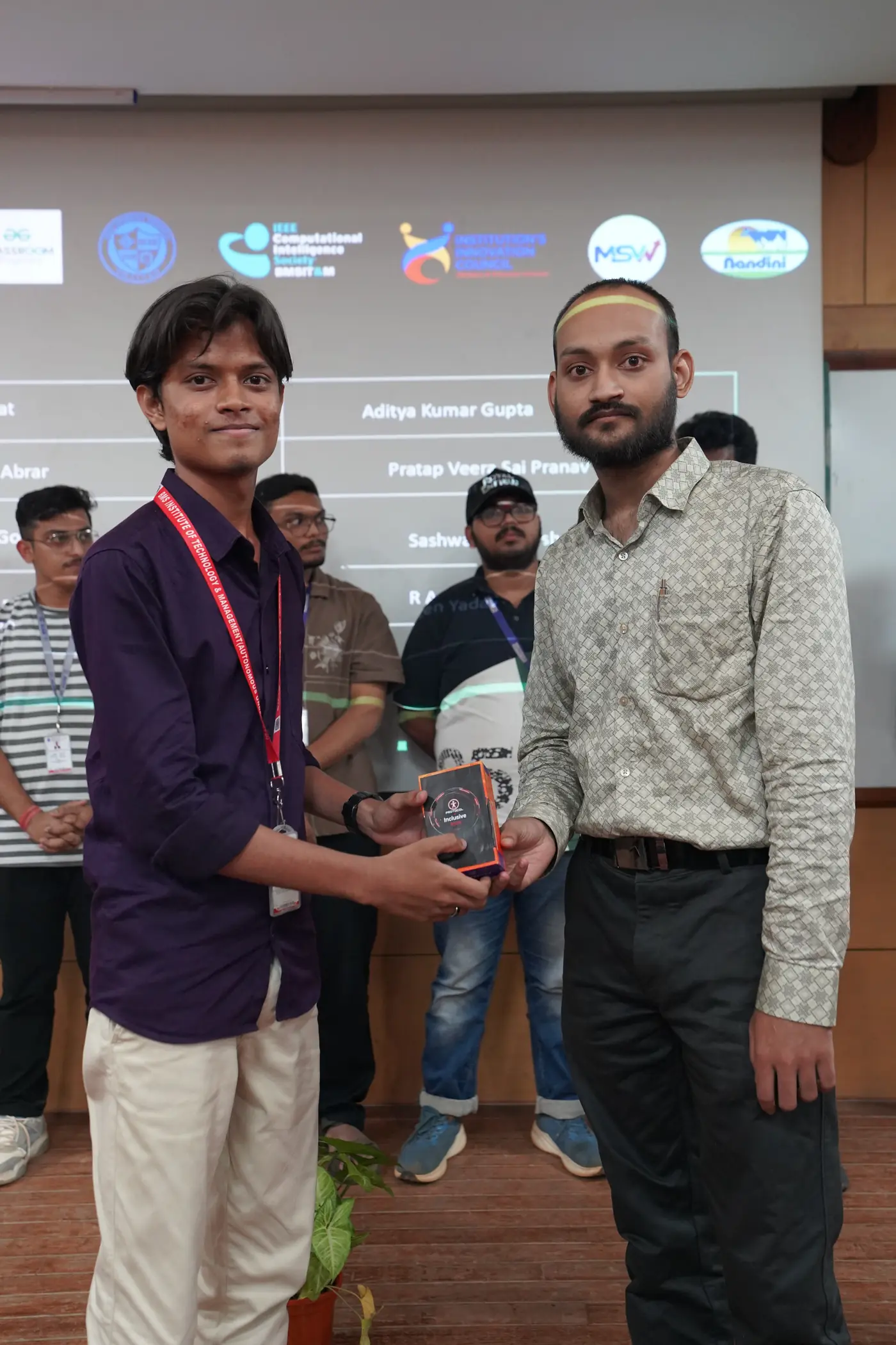 Amit Kumar Singh with a Top 10 team member